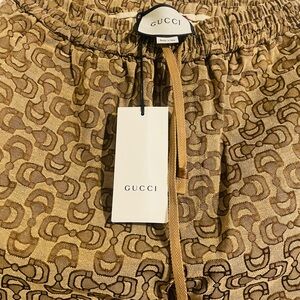 Gucci HORSEBIT JACQUARD-LOGO TRACK PANTS IN BROWN, LENGTH IS 40 inches.